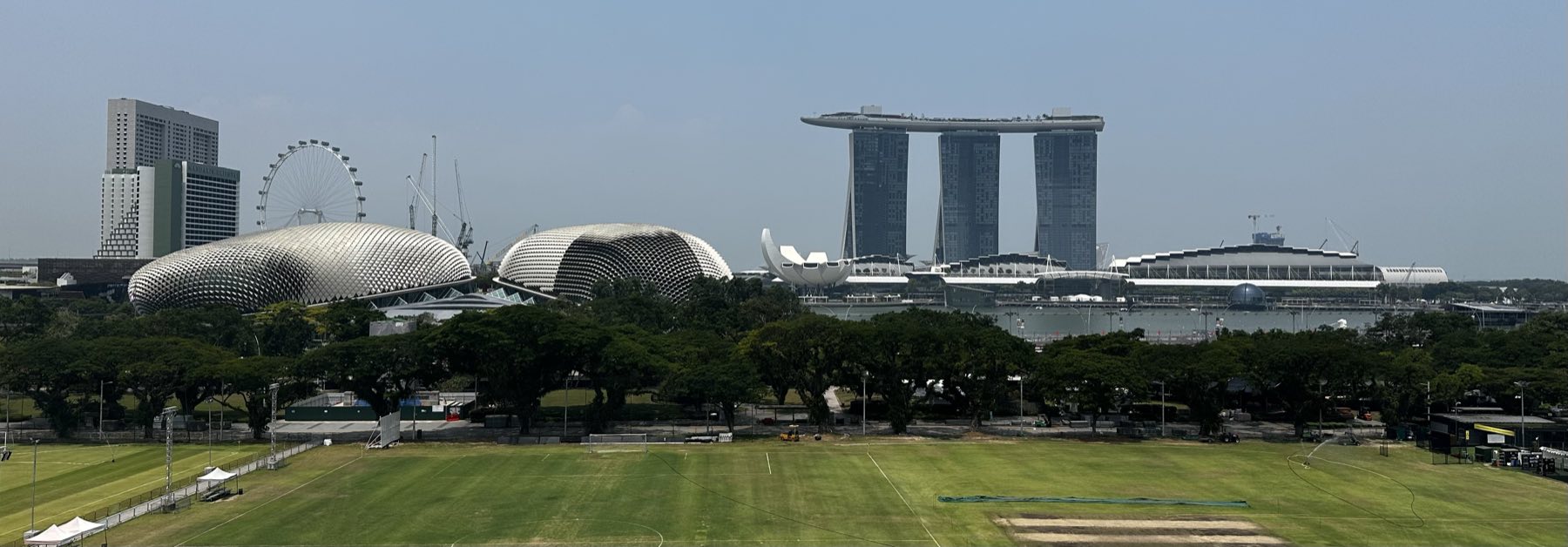 The Esplanade and Marina Bay Sands seen across the Padang